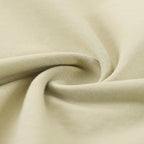 Close-up of beige fabric with folds